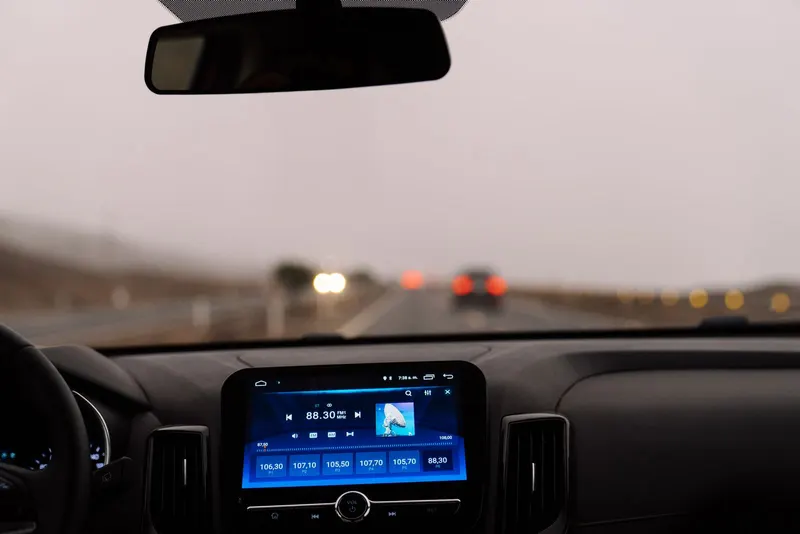 View of the road ahead through a car windshield